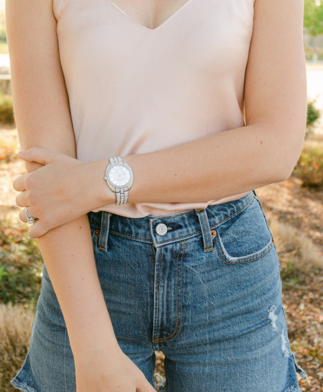 girl posing with watch